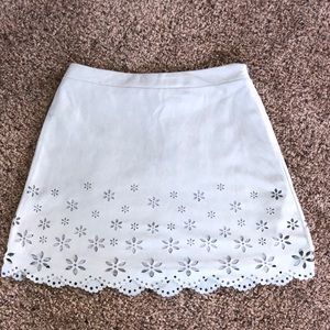 Baby blue, suede skirt with flower cut outs!